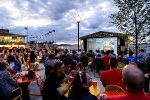 People relax in a recently-renovated section of seating at the Memorial Union Terrace